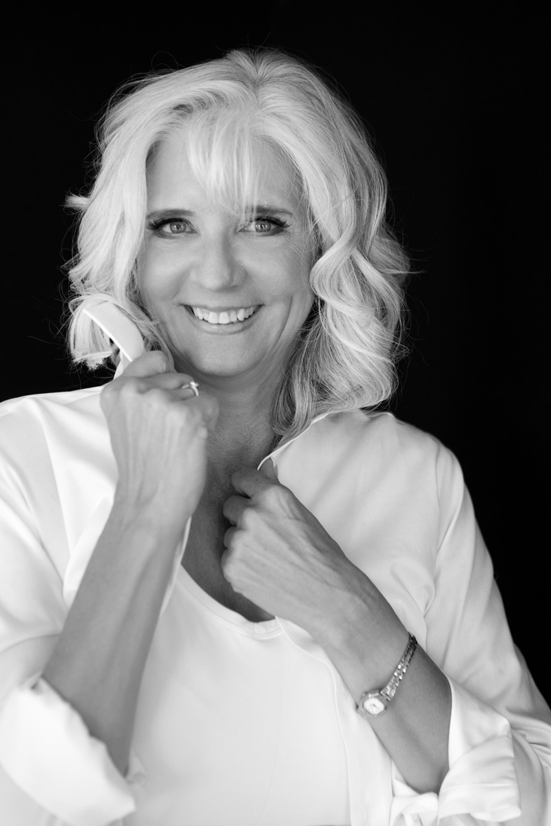 ICONIC Experience 40+ Boise — black-and-white editorial three-quarter portrait of a woman over 40