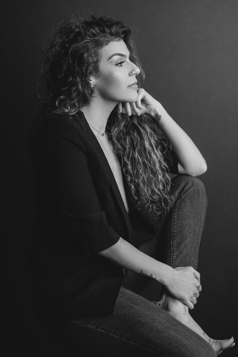 ICONIC Experience 40+ Boise — black-and-white profile editorial portrait of a woman over 40